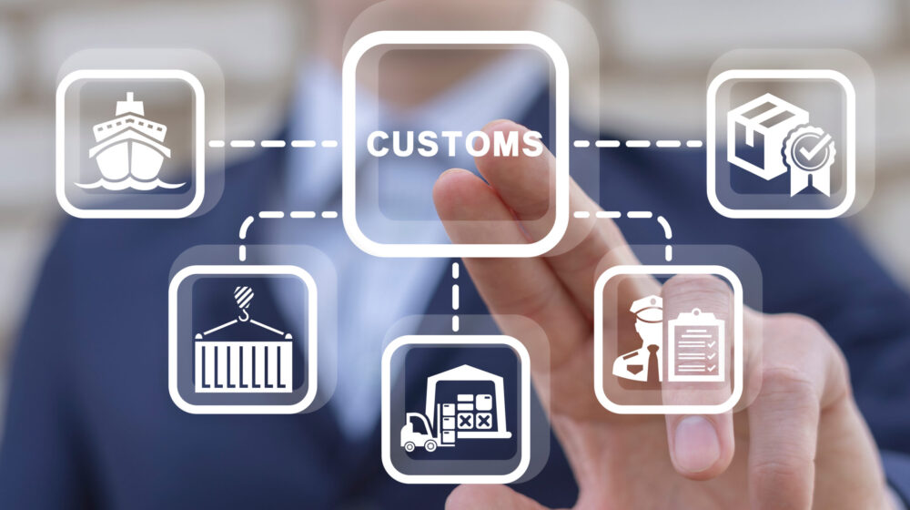 Businessman interacting with a digital interface featuring customs-related icons.