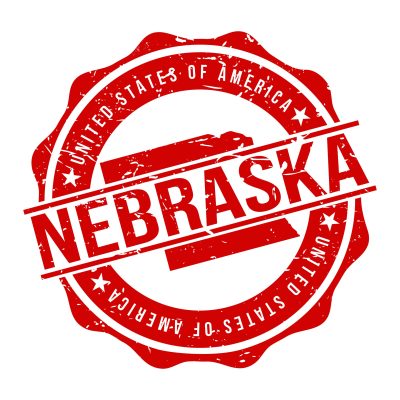 Nebraska America Original Stamp Design Vector Art Tourism Souvenir Round. Red circular Nebraska stamp with United States of America text